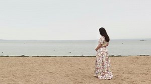 clip-1058496337-happy-pregnancy-family-parenthood-cute-pregnant-woman