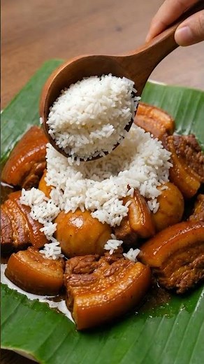 Pork belly egg rice served on banana leaf pure comfort