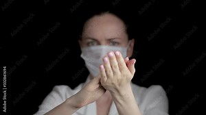 Medical lab worker with protective sterile in face mask shows how to handle, disinfect and wash your hands in hospital. Coronavirus (2019-nCoV). Health care personnel health medicine concept.