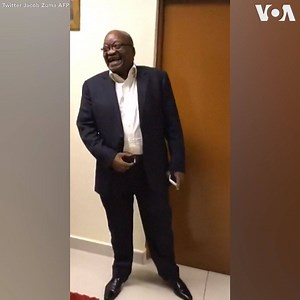 ▶️ Former South African president Jacob Zuma tweeted a video of himself dancing and gleefully chanting "Zuma must fall" the night before testifying against corruption charges at a state commission, held Monday, July 15. 👉 Zuma has denied allegations of corruption, saying he was a victim of conspiracies to end his career, ruin his reputation and kill him. The ex-South African leader said he has "been vilified" and has been a victim of "character assassination over 20 years." https://www.voanews.