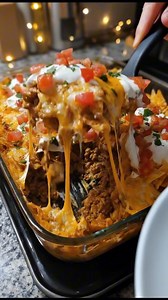 Mexican White Trash Casserole This cheesy Mexican White Trash Casserole is one of those fun, crowd-pleasing dinners my family asks for all the time. The layers of seasoned beef, creamy sauce, melty cheese, and crunchy nacho chips make my kids say, “This tastes like taco night and nachos combined!” Easy, bold, and absolutely irresistible. Ingredients: 1 lb ground beef 1 small onion, diced 1 packet taco seasoning (1 oz) 1 can Rotel (10 oz, undrained) 1 can cream of chicken or cream of mushroom sou