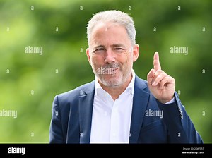 Dresden, Germany. 22nd July, 2021. Football: 2nd Bundesliga, SG Dynamo Dresden before the start of the season, press conference at the Transparent VW Factory. Dynamo's commercial director Jürgen Wehlend stands in front of the manufactory. Credit: Robert Michael/dpa-Zentralbild/dpa - IMPORTANT NOTE: In accordance with the regulations of the DFL Deutsche Fußball Liga and/or the DFB Deutscher Fußball-Bund, it is prohibited to use or have used photographs taken in the stadium and/or of the match in 