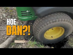 Ride-on mower stuck fast… how do you get it out of here?