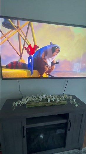 The nut job : Raccoon and cardinal get stranded at sea and they’re surrounded by sharks
