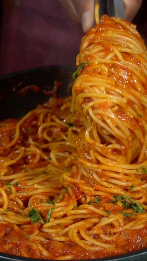 Nigerian Spaghetti is my favorite kind of spaghetti!!! It is well seasoned and will satisfy your appetite. I paired this with turkey wings and a cold Malt. #holidayrecipes #spaghetti #pasta | BlessitsJeff1