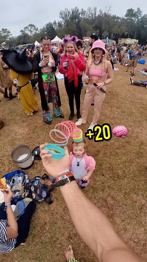 Come to my slinky workshop March 11 in Denver, CO if you wanna learn how to do this! Slinky included - link in bio! 🧠 This was shot at Suwannee Hulaween 2022 in Florida. 🐊 #slinktok #slinkytricks #slinky #suwanneehulaween #hulaween #musicfestivals #musicfestival #rave #ravebaby