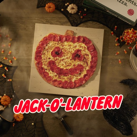 A spooky-good, pumpkin-shaped large thin crust pizza topped with pepperoni, olive eyes, and cheese for $11.99! | Papa John's Pizza