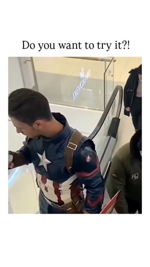 funfunny🤣 | The video depicts a Captain America cosplayer on a mall escalator struggling to lift a replica of Thor's Mjolnir, secretly magnetized to... | Instagram