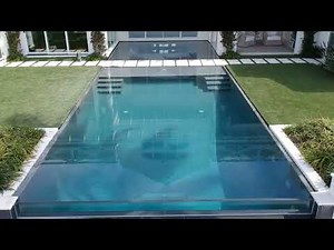 Zero Edge Pool Elegance with Glass Negative Edge