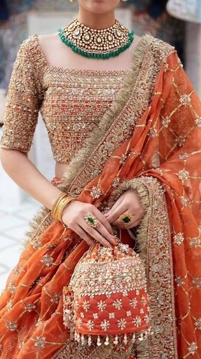 Stunning Indian Wedding Dress in Vibrant Orange | Indian Bride Outfit