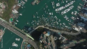 Aerial view of Aberdeen bay, Hong Kong, marina and Typhoon shelter with hundreds of small boats on a clear Summer day.