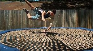 Slow-mo video of man diving into 1000 mouse traps is painfully entertaining!