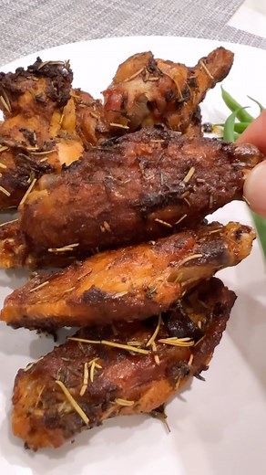 She #SERVED Italian Lemon-Herb Chicken Wings. These unbelievably tasty wings are roasted in olive oil and lemon until crusty and delicious. Truly addictive and so easy to make. Avoid using non-stick baking sheets or parchment paper. Those crusty bits on the bottom of the pan is where the magic happens! These are a family favorite for football Sundays or any night of the week. Recipe available in my book SERVED at CarolineSomers.com. | Caroline Somers