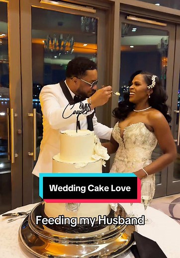 Bride Feeds Husband During Cake Cutting Ceremony