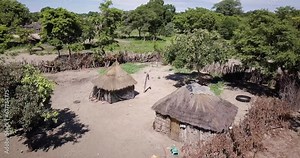 4K Aerial drone footage of Visiting A Rural Namibian Village in Caprivi strip, Namibia. Traditional african houses. High quality 4k footage.