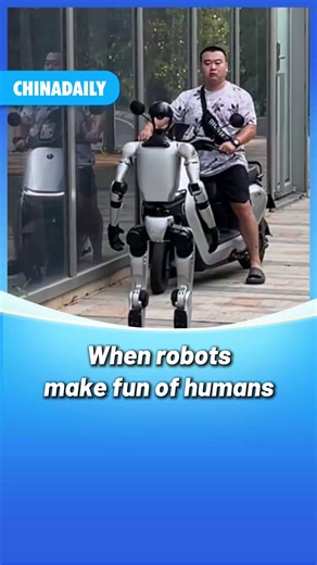 Robots popped up on the street out of nowhere, heading straight for people. Some people get playfully chased, while a motorcyclist grabs a helmet to put on. #robot #tech #FunChina #fun | China Daily