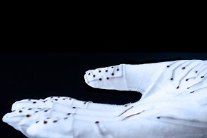 Sensing and Mapping Tactile Stimuli with a Glove