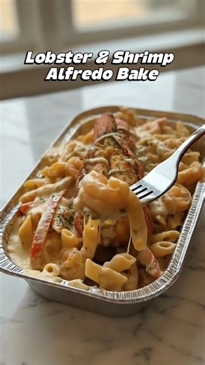 🦞 Lobster & Shrimp Alfredo Bake A rich, creamy seafood pasta bake loaded with tender shrimp, buttery lobster, and cheesy Alfredo sauce perfect for a special dinner or an impressive comfort meal. 🛒 Ingredients (Serves 4–6) For the Pasta: 12 oz penne or cavatappi pasta Salt (for boiling water) For the Seafood: 1 lobster tail, cooked and chopped 1 cup shrimp, peeled and deveined 2 tablespoons butter 3 cloves garlic, minced ½ teaspoon paprika ½ teaspoon Italian seasoning Salt & black pepper to tas