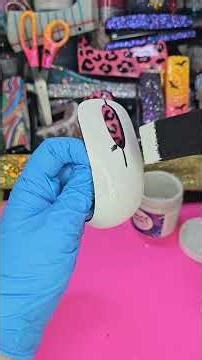 Let me show you how to decorate a computer mouse with a rainbow glitter theme while we talk about