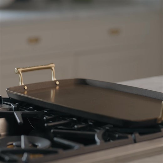 Introducing the Smithey Double Burner Griddle, the most beautiful addition to your kitchen. It boasts an extra-spacious cooking surface and commercial-grade functionality. With its elegant embossed handles and thoughtful design, it’s a permanent fixture on your range you’ll never want to put away! | Smithey Ironware Company