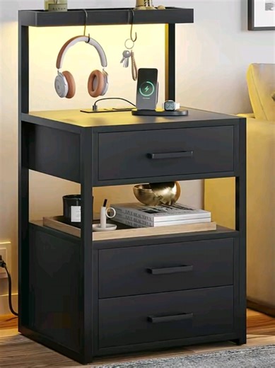 Replying to @leonaluck This Sikaic Nightstand isn't just a side table; it's a multi-functional charging station with built-in USB ports and wireless charging. I love the aesthetic matte black finish, the ergonomic height is perfect for easy access. It’s a heavy-duty bedside table with LED motion sensor lights that make it the coolest nightstand ever for organized living. #newyearnewme