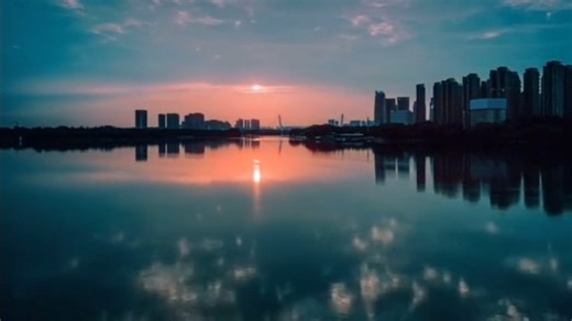 #TourisminShenyang: Dawn breaks over Shenyang, casting reflections of a city rising with the sun. | Discover Shenyang Here