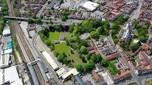 Aerial footage of the historical Selby Abbey in the town of Selby in York North Yorkshire in the UK showing the English medieval church buildings displaying both Norman and Gothic styles in the town