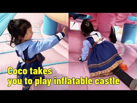 Coco takes you to play inflatable castle.