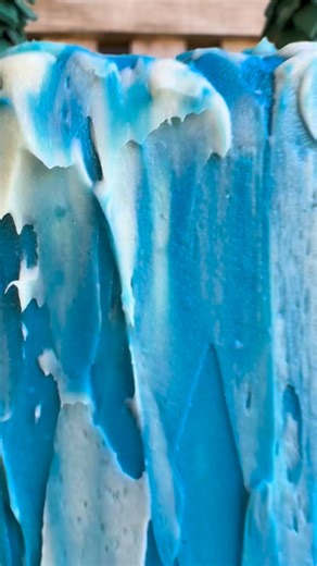 The white accents in the waterfall give the illusion of moving water. This waterfall and river rock cake is all buttercream! And it's based on an AI (artificial intelligence) design. It's giving How to Train Your Dragon Scottish Highland feels, | Artisan Bake Shop | Facebook