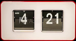 Vintage Old Flip Clock with Moving Numbers of Hours and Minutes in Time Lapse. Retro Mechanical Clock Run 24 Hours and Change Showtime in Fast Motion. Flowing Time Concept. Counting Down Time