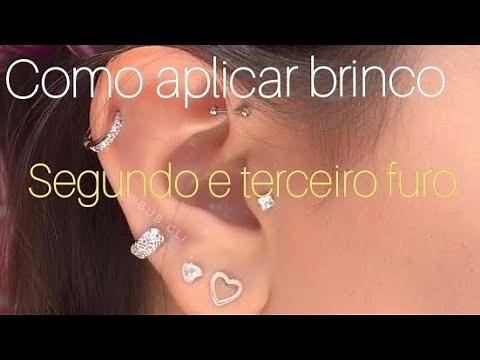 como colocar brinco na orelha- perfuração de lóbulo auricular.