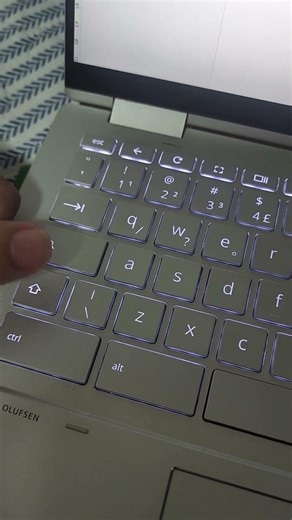 How do I add the @ symbol to my laptop screen?