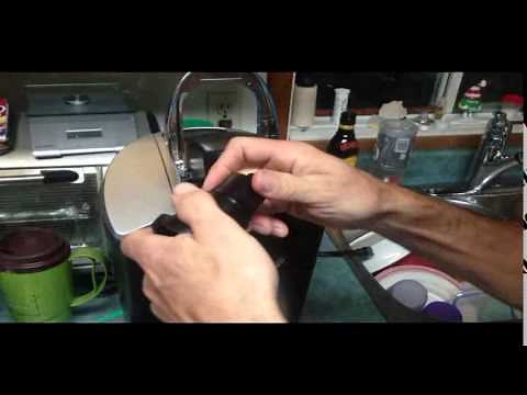 How to Fix or Repair a clogged Keurig coffee maker with a paper clip.