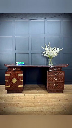 Mid Century Chinese Partners Desk/ Hardwood Writing Desk / Double Sided Desk £1275 A large Chinese hardwood partner's desk (same on both sides) the pagoda style top with simulated rattan surface and applied bamboo details. The flanking pedestal cupboards set with two doors fixed with elaborate brass hinges and closures on one side and three short drawers on the other. Circa 1960. This is a fascinating and eye-catching vintage partner's desk. Graced with profuse detail and appealing colour, the a