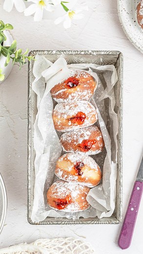 ⭐️ NEW! These fluffy, fresh, homemade jelly-filled donuts are deep fried with a crisp outside and pillowy inside, dusted with powdered sugar to finish. The dough is my base brioche dough with a bit of vanilla added, and I usually use strawberry jelly for the filling but you can use any fruit jelly you like! Just don’t use jam or preserves — they have real fruit pieces in them and will clog your piping bag right up. (Ask me how I know that 🙃) All my best donut tips are on the blog for you! ⁠ ⁠ �