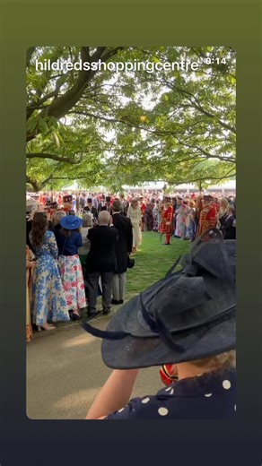 Twitter warriors try to claim the monarchy is irrelevant, but people show up for their garden parties in the thousands. The Royals are loved. The Prince and Princess of Wales walking through a crowd of people on both sides. Video from Hildreds shopping Centre.