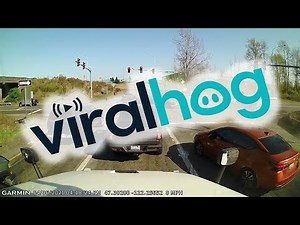 Brake Failure Sends Semi Truck Plowing Through Intersection || ViralHog
