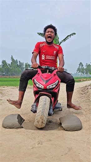 A Little boy is having fun with his motorbike 12