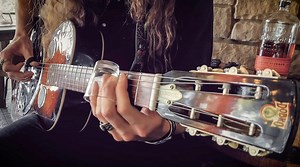 I've always loved this song, and especially appreciate the stripped-down, back porch arrangement that Lynyrd Skynyrd recorded, with just the vocals and the resonator slide guitar. I've gotten a few requests for it lately, and it seemed like a perfect song to record on the back porch, and a storm slowly moving in. I've been diggin' using the shot glass as a slide lately, as it changes my technique slightly and forces me to think of the slide a little differently. Plus, I think they are the best s