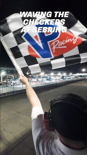 Waving the VP Racing Fuels checkered flag at Sebring!