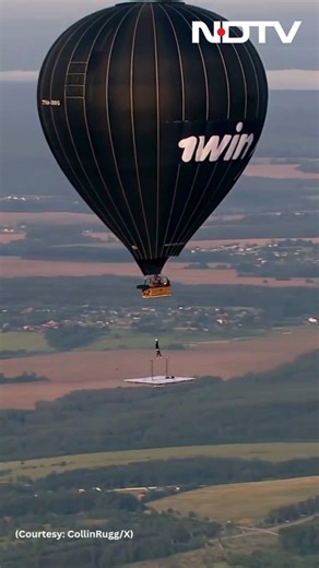 Sergey Boytsov, a Russian athlete, performed several gravity-defying stunts whilst hanging from a hot air balloon. The gymnast claimed that he set a world record. The 30-year-old was seen performing on a horizontal bar, which was suspended from a hot air balloon. The video has left the internet divided, with some calling it "incredible", and others saying that the stunts are not worth risking one's life as he was not carrying any parachute. The hot air balloon was reportedly 1,500 metres up in t
