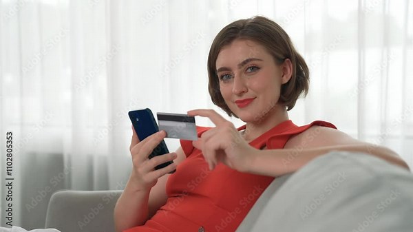 Woman shopping or pay online on internet marketplace browsing for sale items for modern lifestyle and use credit card for online payment from wallet protected by prim cyber security software Stock Video