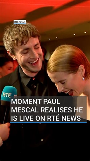 This is the moment actor Paul Mescal realised he was being interviewed live on RTÉ’s Six One News. Our Arts and Media Correspondent Evelyn O’Rourke was chatting to actor Jessie Buckley at the Irish premiere of Chloé Zhao’s historical drama, Hamnet, when the Academy Award nominee literally skipped into the conversation. 📲#rténews #paulmescal #jessiebuckley #hamnet | RTÉ News