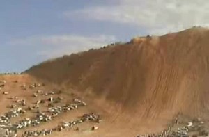 Jeep attempts to climb up a hill.