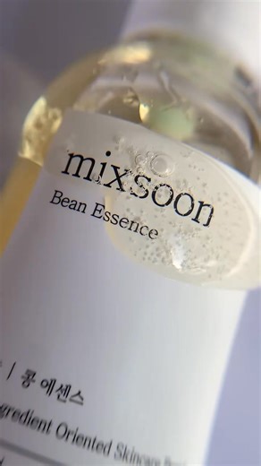 The Mixsoon Bean Essence is a gentle skincare product designed to exfoliate and hydrate the skin without causing irritation. It contains key ingredients such as fermented bean, barley, pomegranate, and Korean pear extracts, which work together to strengthen skin health, moisturize, and revitalize skin tone while addressing dead skin cells to achieve a smooth texture. The essence is vegan and free from alcohol and artificial fragrances. | Glowstar