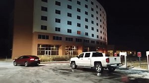 Watch: how to tow a pickup from blocking a charging station with a Tesla