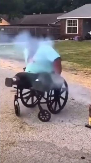 Man in wheelchair lights firecracker and gets stuck #fireworks