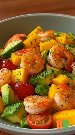 Shrimp Mango Avocado Salad Freshly seared shrimp are paired with ripe mango and creamy avocado, finished with citrus, olive oil, and herbs. Careful heat control and gentle folding preserve clean flavors, vibrant color, and a light, refreshing texture. Ingredients : 1 lb shrimp, peeled and deveined 1 ripe mango, diced 1 large avocado, diced 1/2 cup cherry tomatoes, halved 2 tbsp olive oil Juice of 1 lime or lemon 1 small garlic clove, finely minced Salt and freshly ground black pepper, to taste F