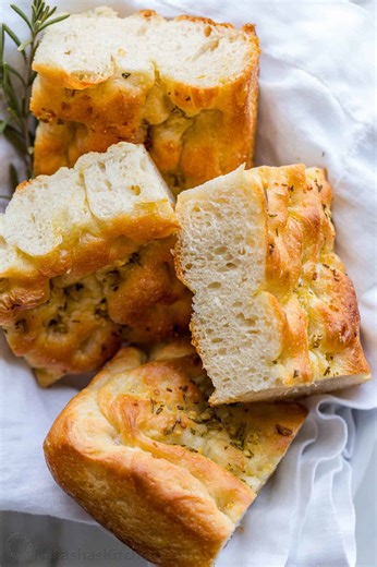 133K views · 1K reactions | This Focaccia Bread recipe has the most crisp chewy crust, airy soft center, and amazing garlic rosemary topping.RECIPE: https://natashaskitchen.com/focaccia-bread/ | NatashasKitchen.com | Facebook