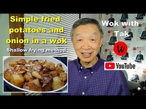 Simple fried potatoes and onion in a wok. Application of shallow frying.